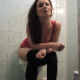 A pretty girl takes a piss and a shit while sitting on a toilet. Some nice plops are heard, but no product is shown in the toilet bowl. Presented in 720P HD. Over 7 minutes.